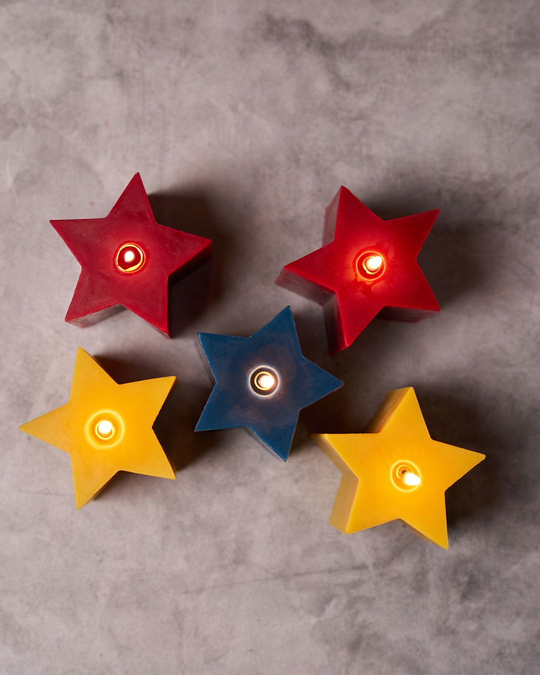 Instagram post with the caption: ✨ New Colors Just Dropped! ✨
Our 5pt Star candles are now availa...